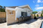 Cabana bar with seating & t.v.